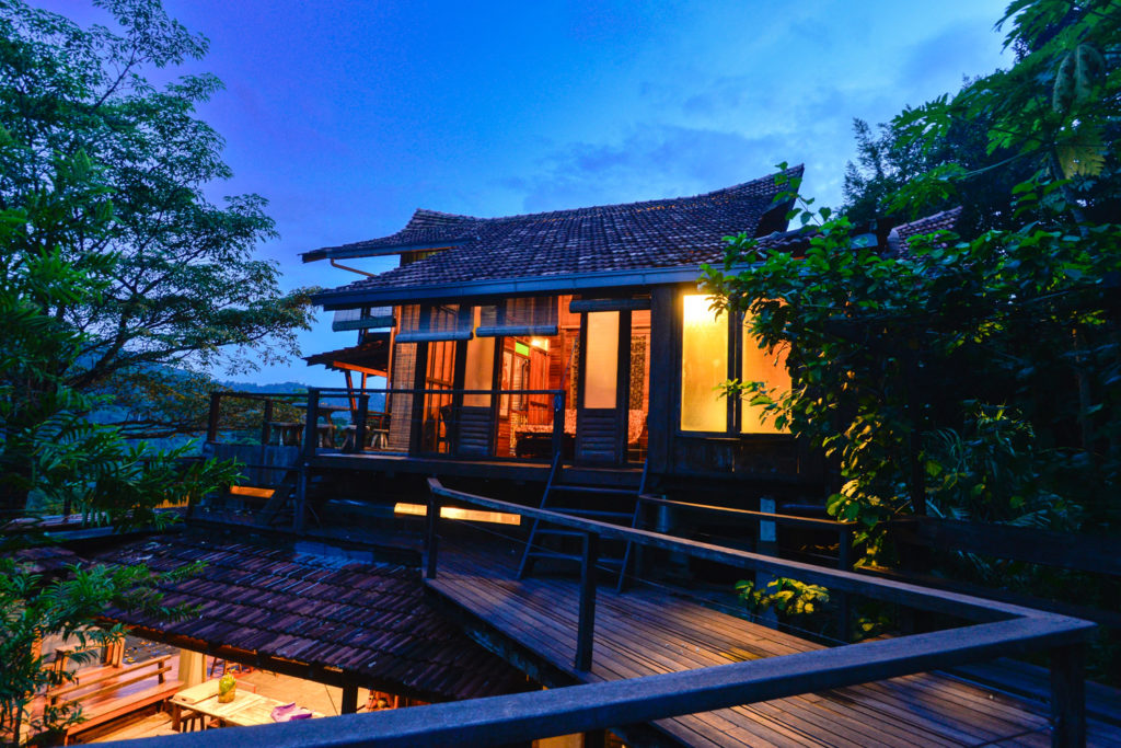 A view of Boomerang room from its balcony. This is a part of Spyder Hill at Pantai Hill Orchard Resort  during twilight.