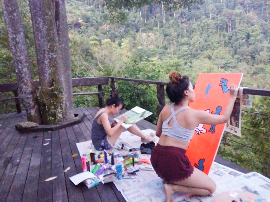 Painters doing art on Spyder Hill deck